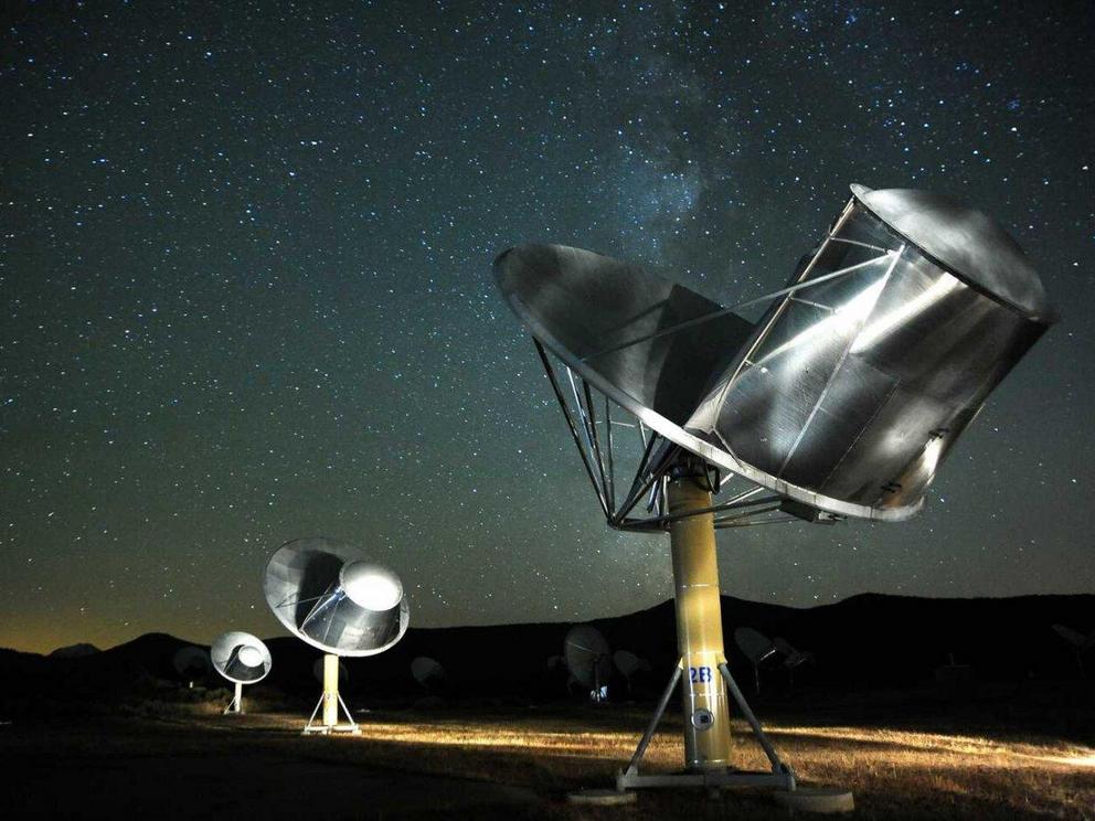 Several antennas that are part of the Allen Telescope Array, radio telescopes that search for signals from alien life.