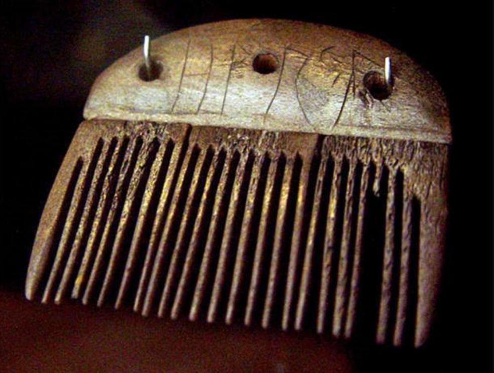 A comb made of antler from around 150 to 200 AD and was found in Vimose on the island of Funen, Denmark. The inscription reads 