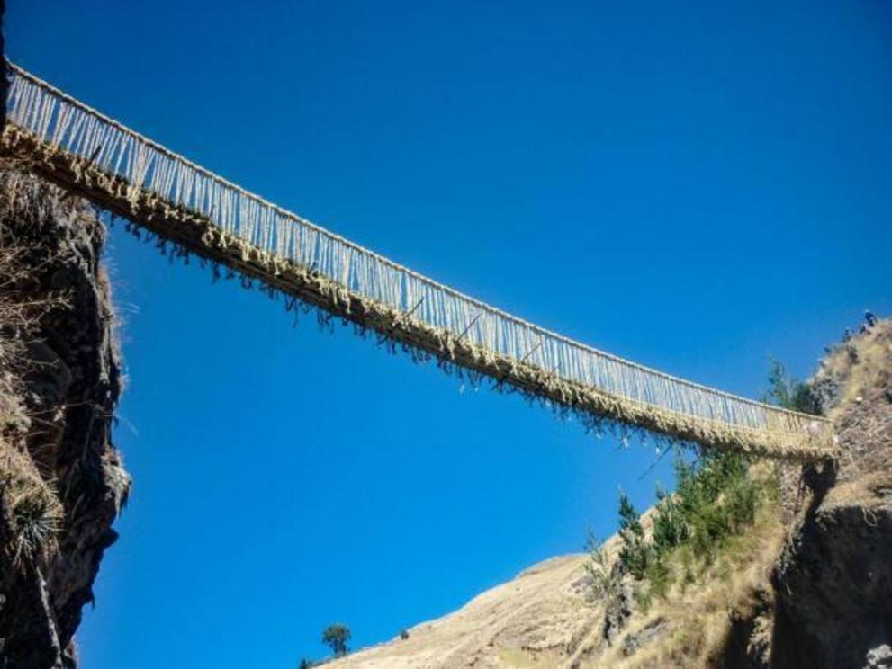 Suspension bridge Q'eswachaca hanging over the Apurimac river, Quehue, Cusco, Peru.