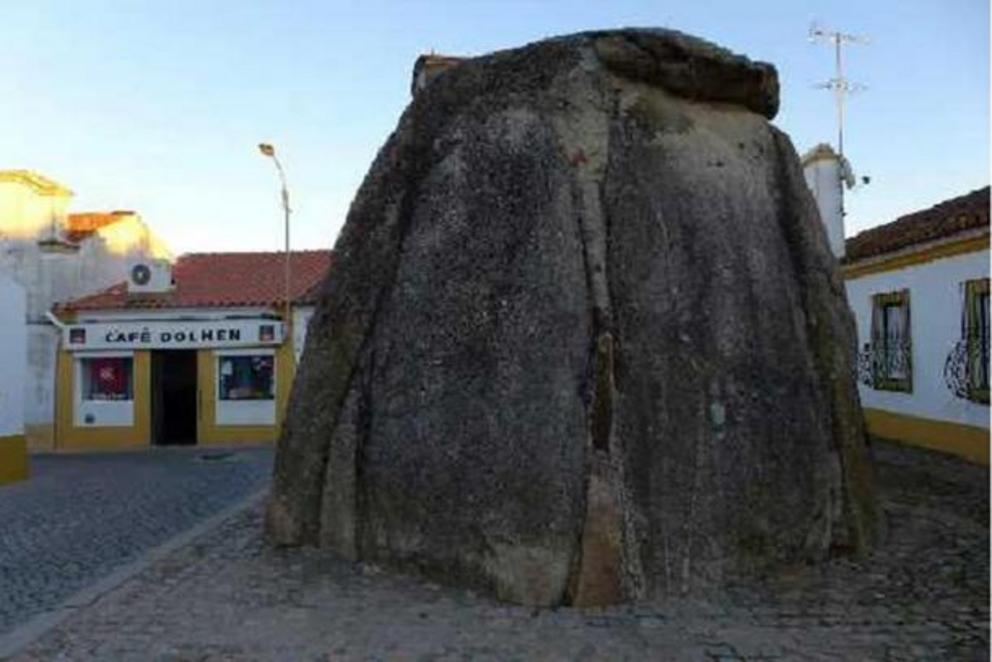 The Church destroyed many dolmens but declared others sacred sites, like this one in Pavia, Portugal. Note the ‘Cafe Dolmen’ in the background.