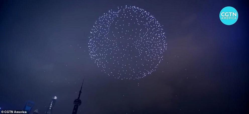 The devices create giant spheres, created text for the countdown and created a massive man running across the sky, which is said to represent 'the huge changes and glorious achievements Shanghai has made in the past 40 years of reform and opening up'