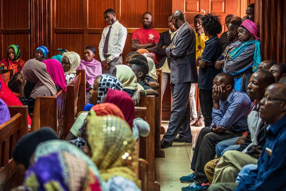 People gather inside a courtroom in Nairobi, Kenya for a hearing into a new biometric national identification system on Dec. 18, 2019.