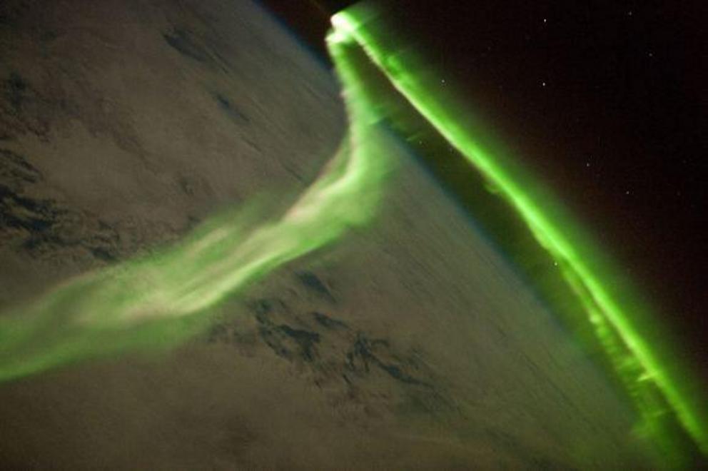 Aurora during a geomagnetic storm that was most likely caused by a coronal mass ejection from the Sun on May 24, 2010, taken from the ISS.