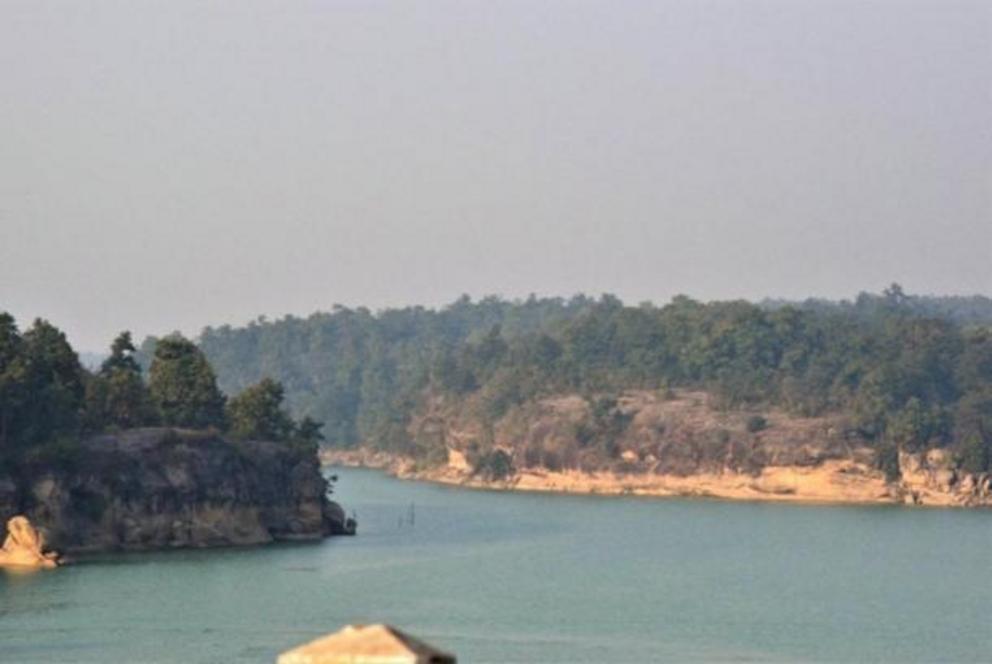 The Hasdeo river and the forest in the background (part of the Adivasi tribe’s home), which is near to Adani’s Parsa coal mine in Chhattisgarh , India.