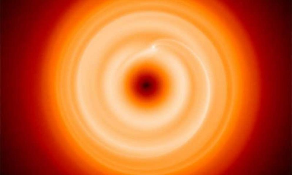 Protoplanetary disc with an orbiting planet. Credit: University of Warwick