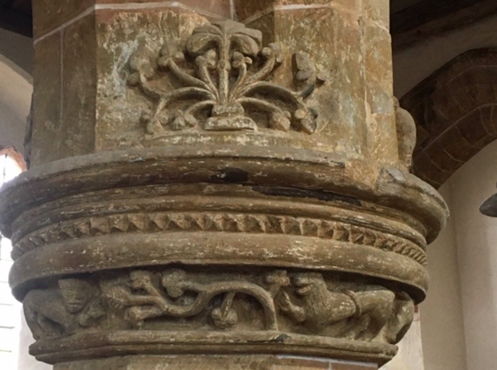 Medieval Carvings- Strange half man, half animal creature lower left.  