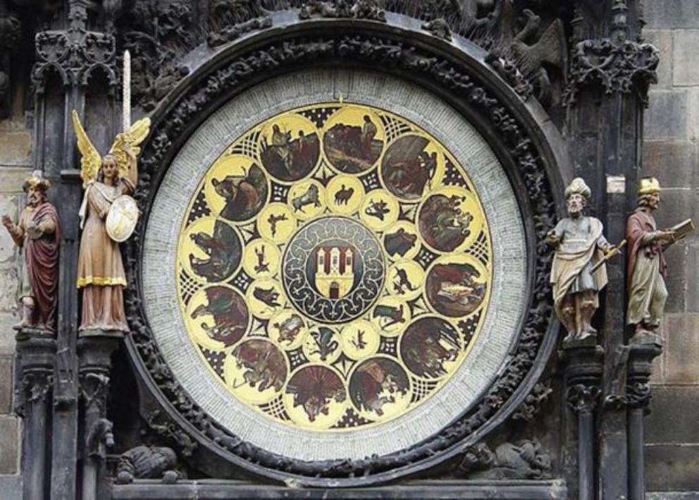 Bottom – the calendar portion of the clock with a philosopher, a chronicler, an astronomer, and an angel.