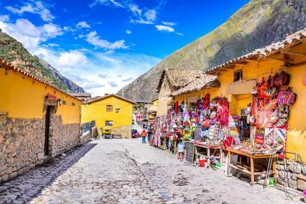 The colorful streets of Ollantaytambo, Peru which pass through the ancient Inca town and lead to the heights of Machu Picchu.