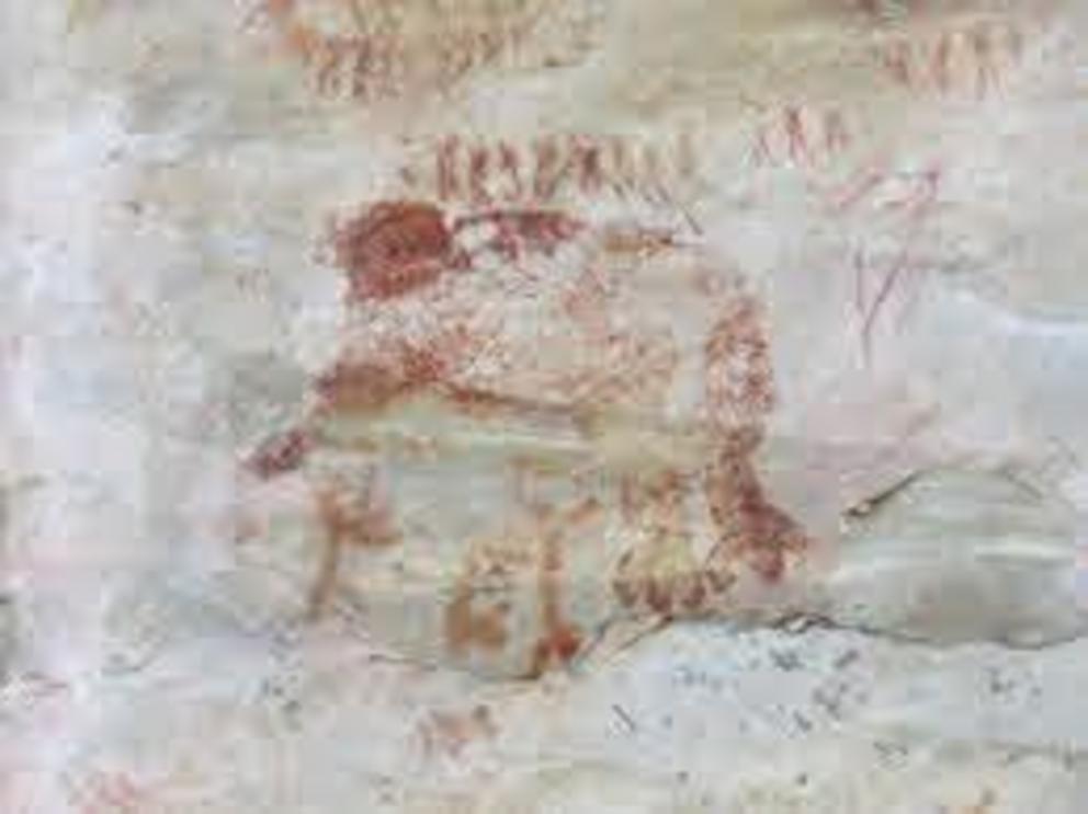 A possible mastodon-hunting scene depicted on the side of a cave in the Serranía La Lindosa region of Colombia.