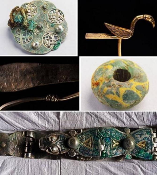 Some of the treasures: A silver disk brooch decorated with intertwining snakes or serpents, a gold, bird-shaped object which may have been a decorative pin or a manuscript pointer, one of the many arm rings with a runic inscription, a large glass bead, an