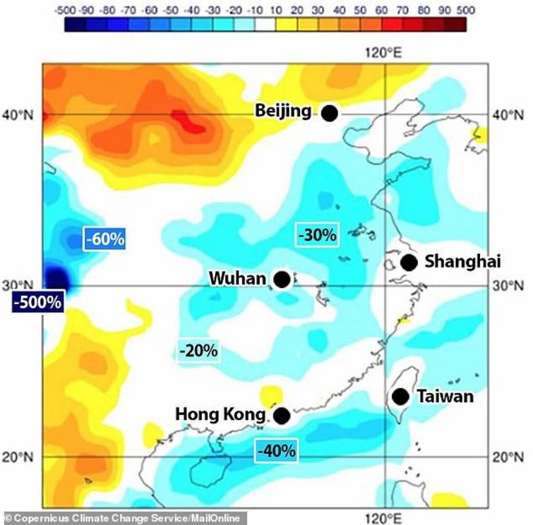 Satellite images compared this February's air quality with the same month from 2017 and 2019 and found a decrease in the amount of PM2.5 emissions in China of up to 30 per cent (pictured, the percentage difference as shown by the colour bar at the top)