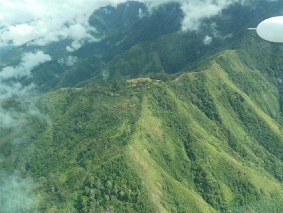 Waim village as seen from the air, in the rugged highlands where the Papua New Guinea artifacts were found.