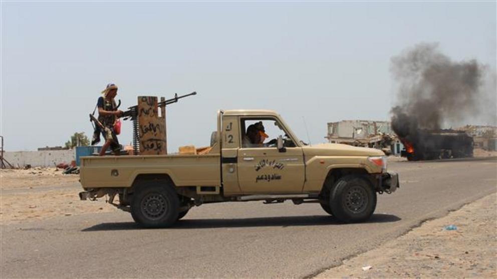 Yemeni southern separatists inspect the site of UAE airstrikes near Aden, Yemen, August 30, 2019. (Photo by AP)