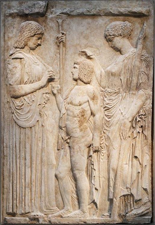 Relief representing Demeter, Kore-Persephone and Triptolemus from the Eleusinian mystery school.