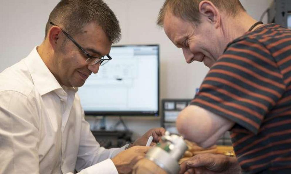 Max Ortiz Catalan in a follow up appointment with one of the patients, at the Chalmers Biomechatronics and Neurorehabilitation Laboratory.