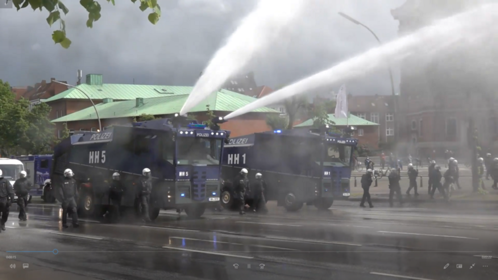 Police deploy water cannons to break up a sparse crowd demonstrating against the sanctioned anti-lockdown rally in Hamburg, Germany, on May 23, 2020 © Ruptly 