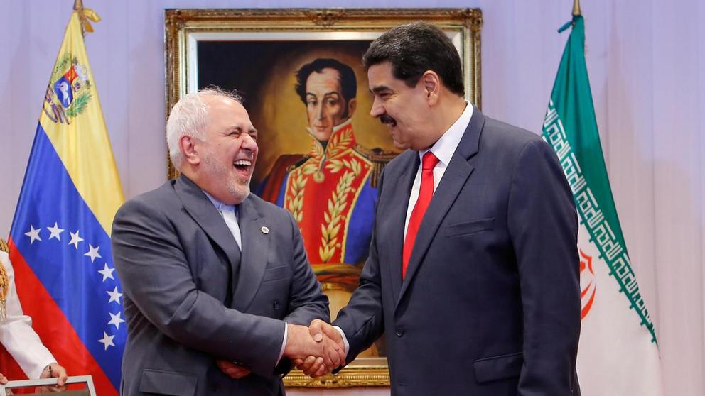FILE PHOTO: Venezuela's President Nicolas Maduro and Iran's Foreign Minister Mohammad Javad Zarif shake hands during their meeting in Caracas, Venezuela July 20, 2019. © Reuters / Miraflores Palace 