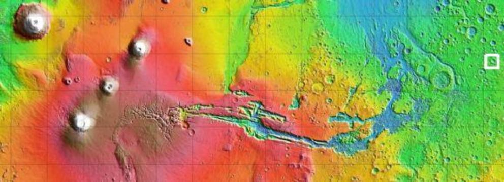 A MOLA topographic map of Mars. The featured image is from the crater at the far right, in the white square. To the left is Valles Marineris, and further to the left is the Tharsis Montes region, and Olympus Mons.