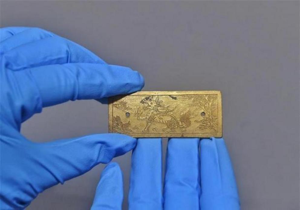 A Golden ornament excavated from the Ming battlefield site on Jiangkou stretch of the Minjiang River.