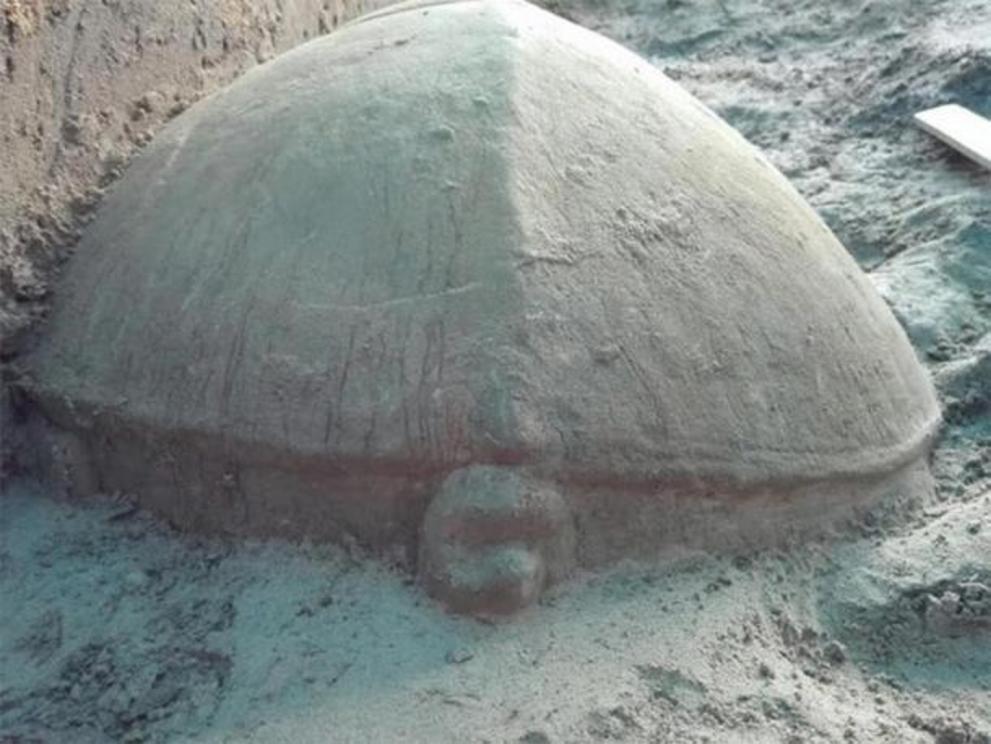 The turtle sculpture found in the Angkor reservoir is believed to have been placed as an offering in the temple’s foundation.