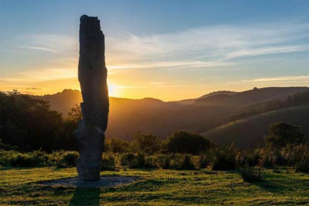 Menhir of Arlobi at sunset, Gorbea Natural Park, Alava, Spain