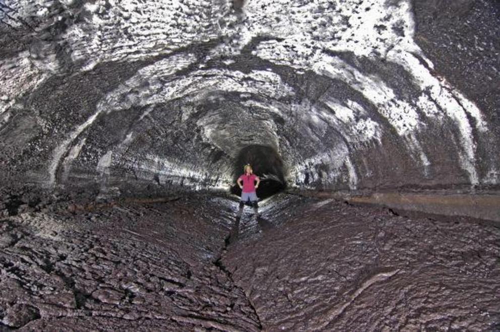 The Kazamura Cave is the longest lava tube on Earth. It features the tell-tale arched ceiling of lava tubes, and the floor was the crust of a former lava lake that collapsed inward as the lake drained.