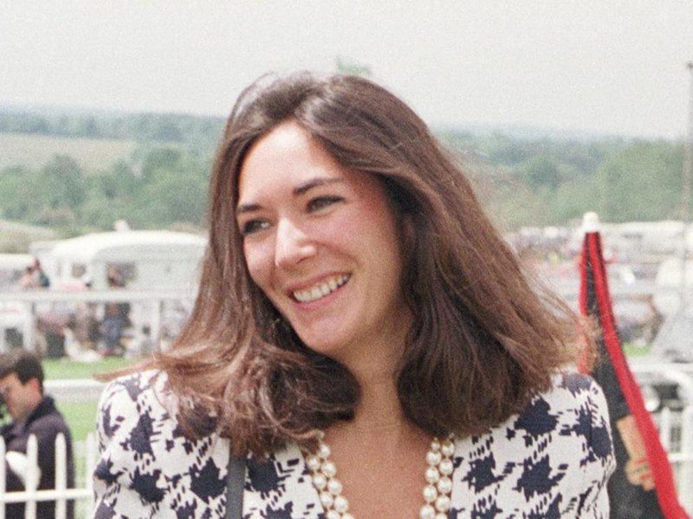 British socialite Ghislaine Maxwell, Jeffrey Epstein's former girlfriend, is pictured in 1991. She now faces multiple counts related to sex trafficking of minors and perjury. She has pleaded not guilty.  Jim James/AP 