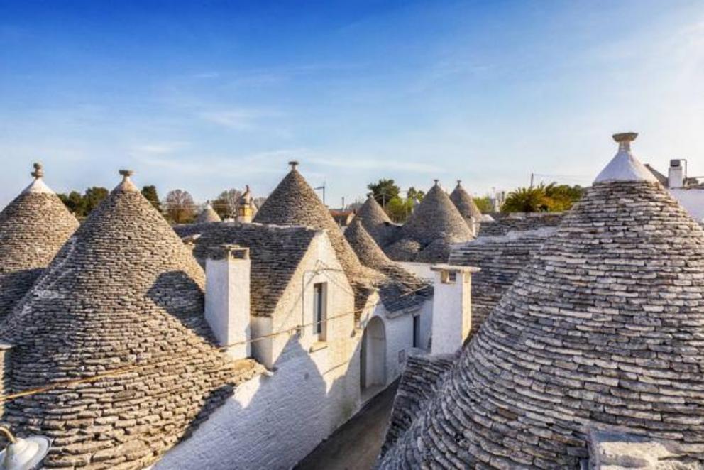 Chiancarelle-clad roofs in Alberobello, province of Bari, Italy.