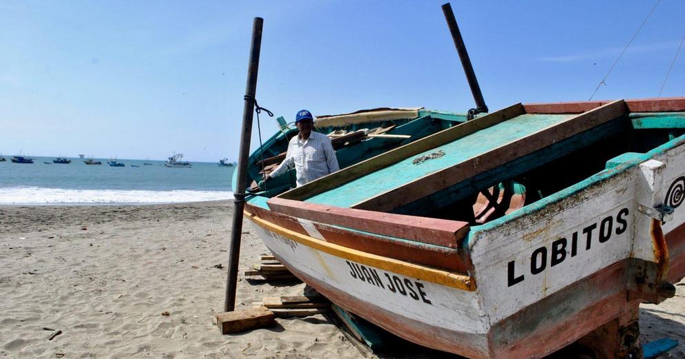Gregorio Eche, who guards Lobitos Beach, in his boat, the San José.