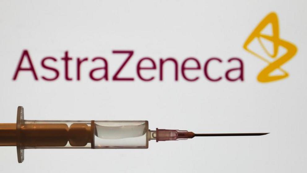 FILE PHOTO: Medical syringe is seen with AstraZeneca company logo displayed on a screen in the background in this illustration photo taken in Poland on June 16, 2020. ©  NurPhoto via Getty Images/Jakub Porzycki
