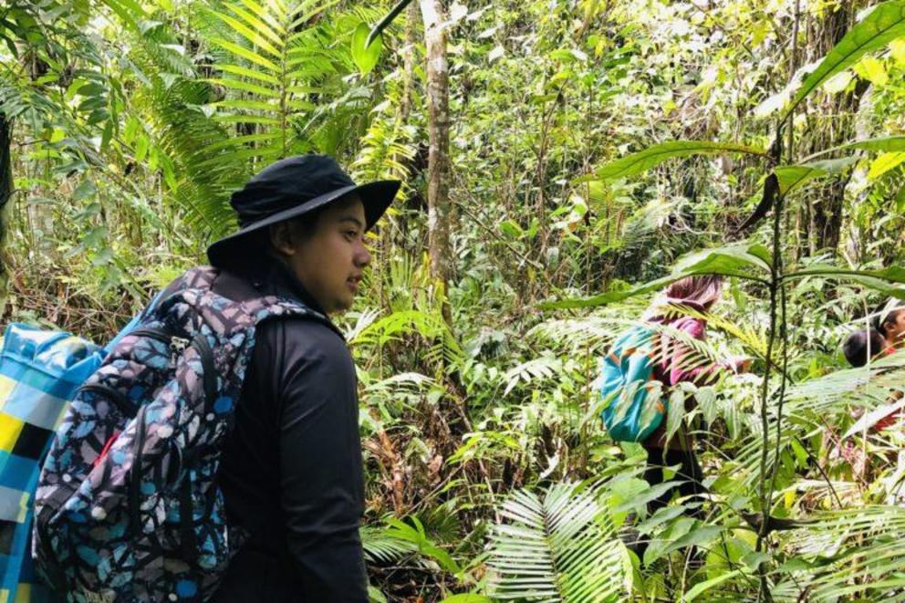 Members of the research team inside the forest in Agusan del Sur province to conduct the study.