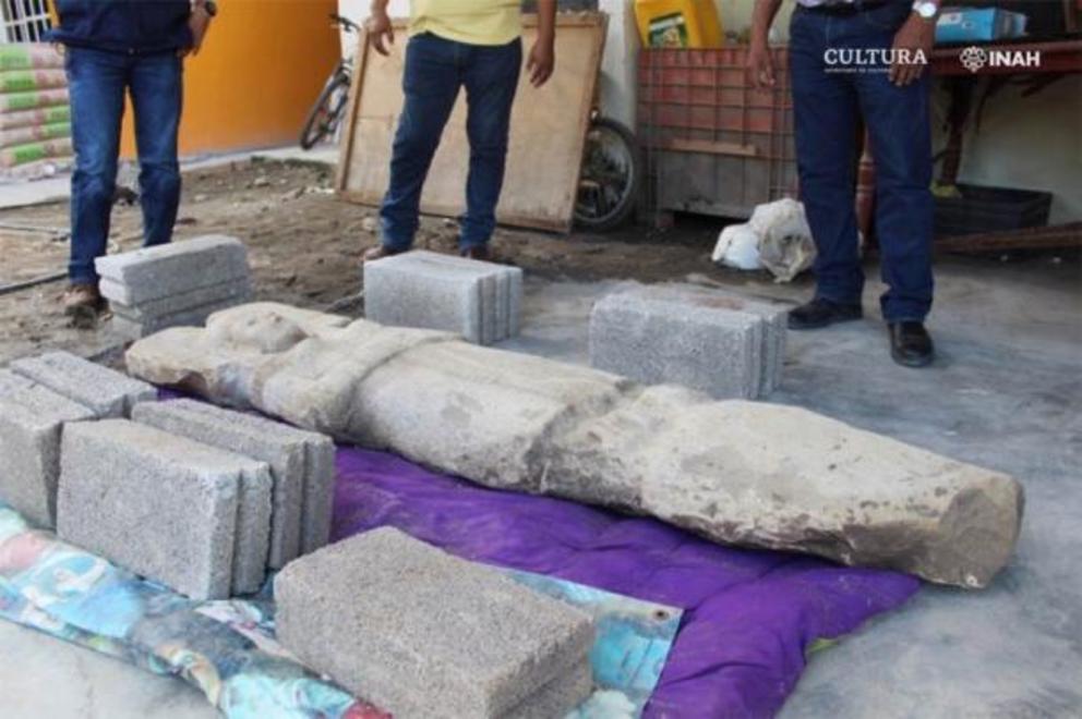 The citrus farmers then alerted authorities of their discovery. Experts are now trying to work out who or what the statue of the Mesoamerican woman represents.