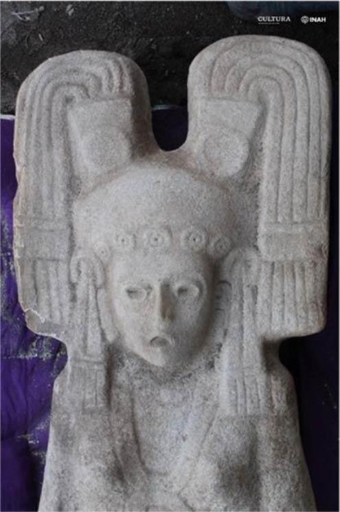 The statue of the Mesoamerican woman has an open mouth and a wide-eyed expression. Experts are trying to work out who or what she represents.