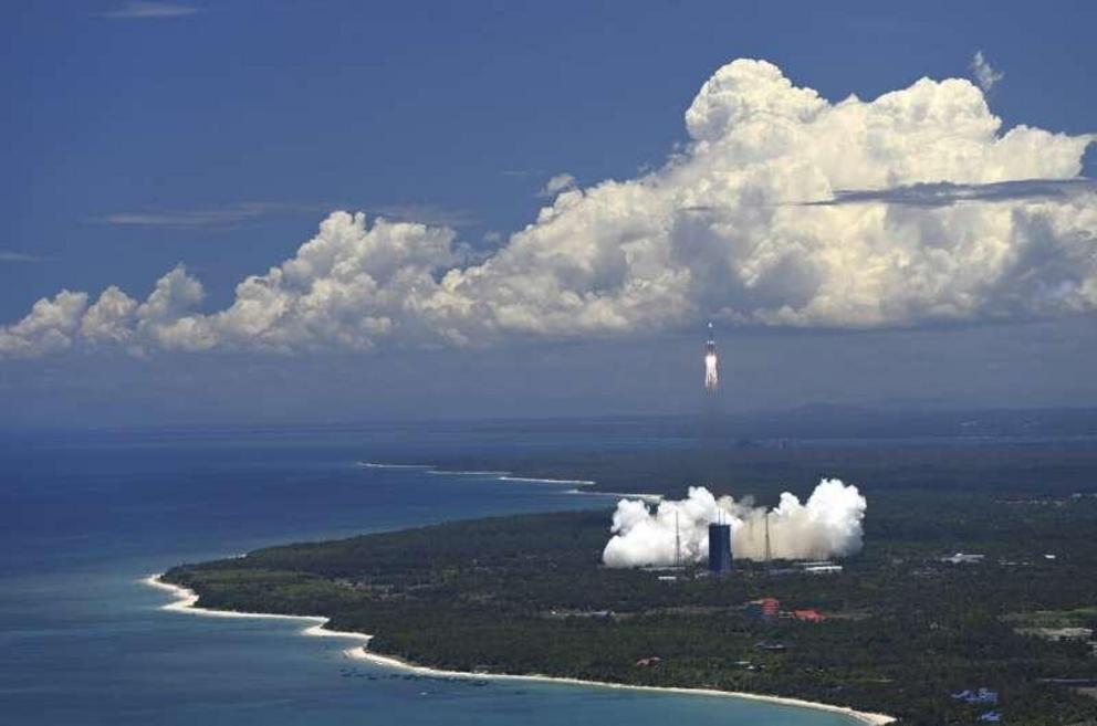 In this Thursday, July 23, 2020 photo released by China's Xinhua News Agency, a Long March-5 rocket carrying the Tianwen-1 Mars probe lifts off from the Wenchang Space Launch Center in southern China's Hainan Province.