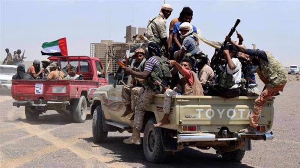 This file photo shows militants carrying a UAE flag aboard a vehicle in Yemen.