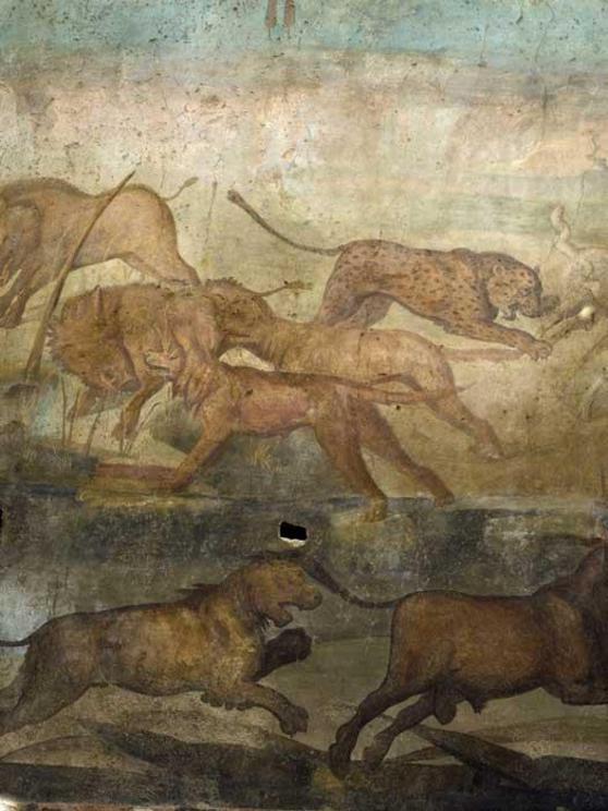 In the wild scene, here a leopard pounces on sheep, dogs chase boars, and a lion pursues a bull.