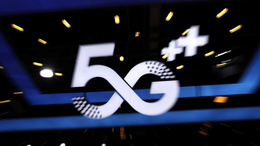 File photo: A 5G sign at a China Mobile booth during the China Internet Conference in Beijing, July 13, 2021. ©  REUTERS/Tingshu Wang