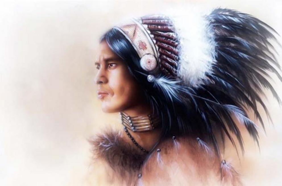 A Native American man with long hair.