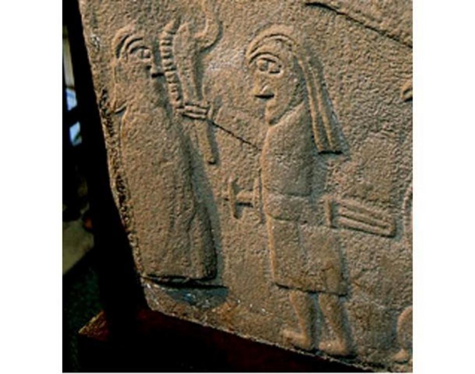 Pictish carved stone from medieval Scotland depicting Samson with locked hair. In the Book of Judges 16:19 of the Old Testament, Samson loses his strength when his seven dreadlocks are cut from his head.