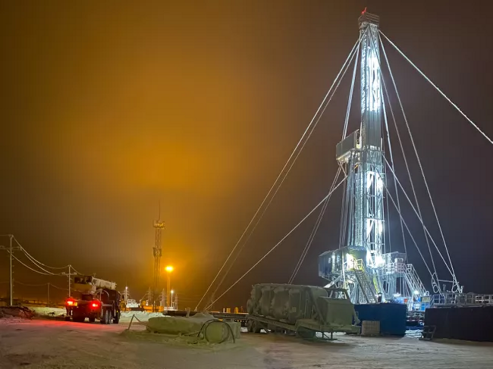 An oil rig in the north of Russia on a winter night.