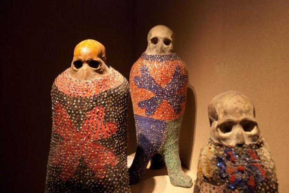 The ideas behind Voodoo and zombies in Haiti come from African religious beliefs and rituals symbolized by these Haitian ritual objects on display at the Ethnographic Museum in Berlin.