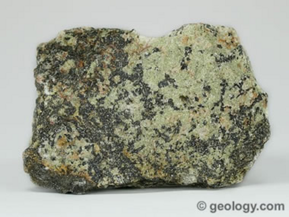 Cassiterite from near Keystone, South Dakota. Specimen is approximately 4 inches (10 centimeters) across.