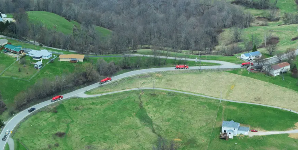 A line of fracking wastewater trucks in Moundsville, West Virginia