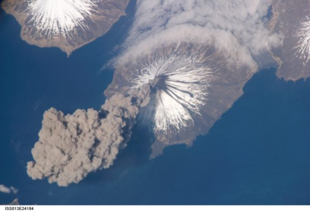 Image taken by a crew member of Expedition 13 from the ISS, showing the eruption of Cleveland Volcano, Aleutian Islands, Alaska.