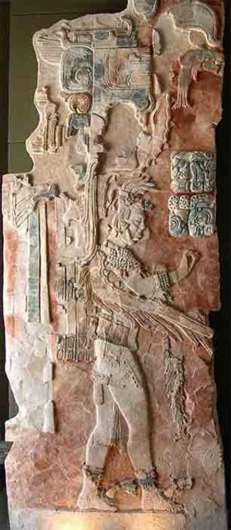 A painted stucco relief in the museum at Palenque, which is similar to the reliefs and mural depictions found at San Bartolo.