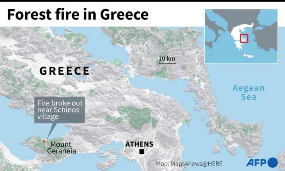 Map of Greece locating the area where a forest fire started near the village of Schinos, prompting evacuations.