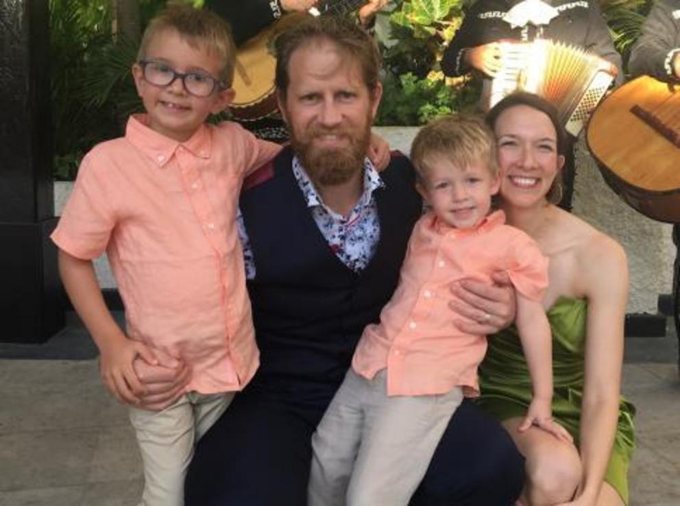 Dr. Cameron Wolfe with his wife and two children.