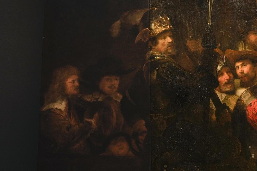 Detail of the Night Watch's left side, showing how Rembrandt's biggest painting just got bigger with the help of artificial intelligence in Amsterdam, Netherlands, Wednesday, June 23, 2021. The Dutch national museum and art gallery reveals findings from a