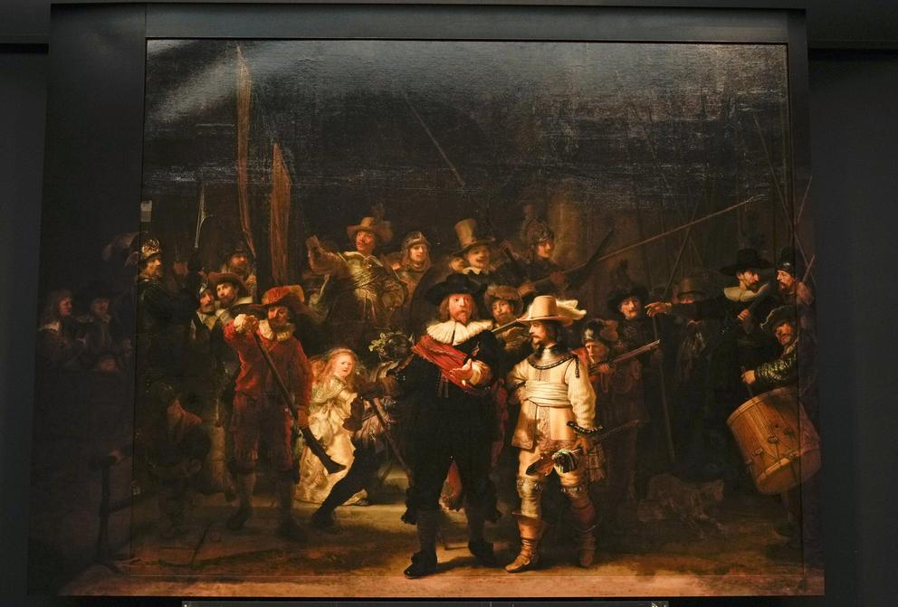 View of Rembrandt's biggest painting the Night Watch which just got bigger with the help of artificial intelligence, see added sides, in Amsterdam, Netherlands, Wednesday, June 23, 2021. The Dutch national museum and art gallery Rijksmuseum reveals findin