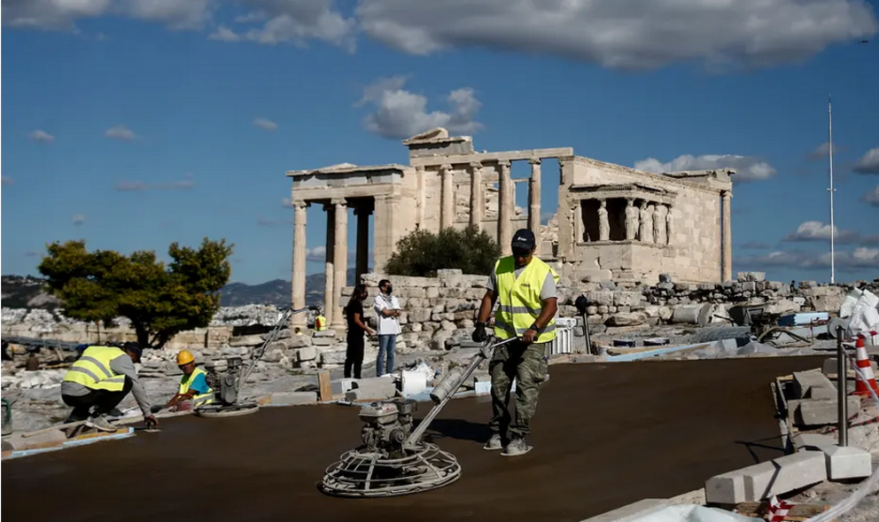 An online petition signed by 3,500 people calls for the concrete pathways to the Acropolis to be removed. Photograph: Yannis Kolesidis/EPA